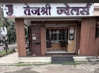 Tejashri Jewellers storefront with the purple TJ signboard